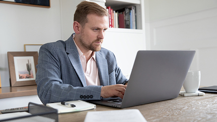 man working on a laptop
