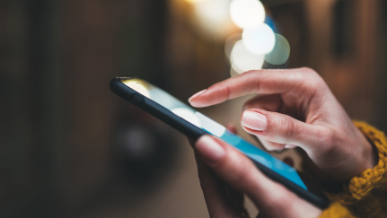 hands holding a mobile phone